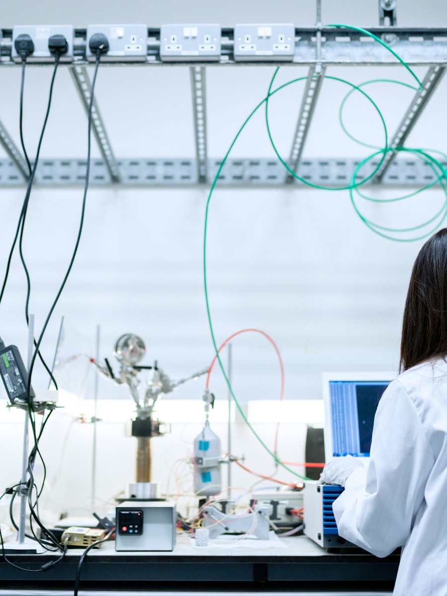 A researcher working at an instrumented laboratory bench